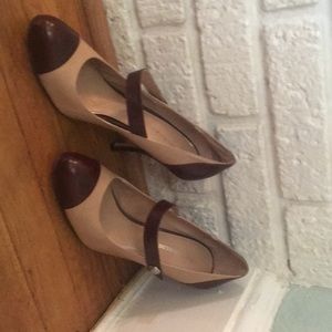 Beige and brown pumps